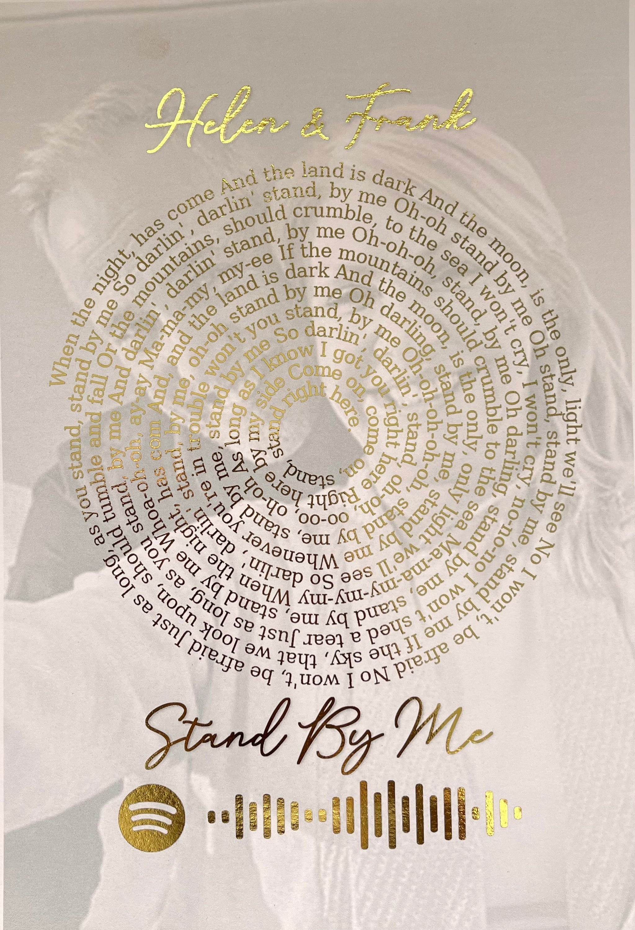 Personalized Spotify Spiral Lyrics & Image Print featuring gold foil lyrics and a background image.