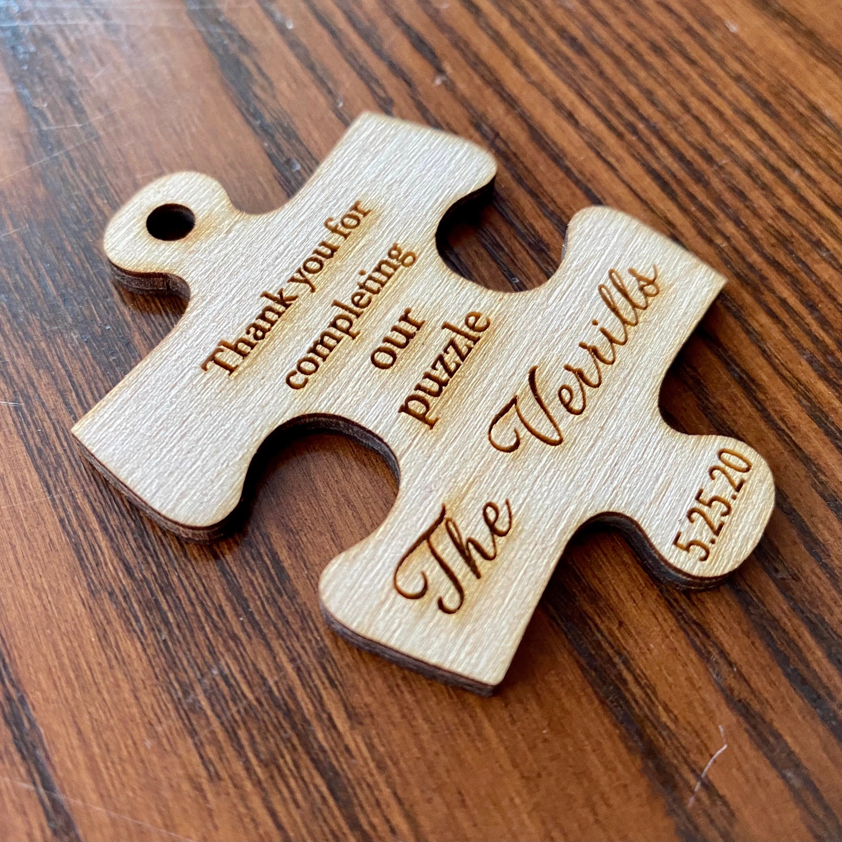 Personalized wooden puzzle piece wedding favor with engraving, showcasing rustic charm and durability.