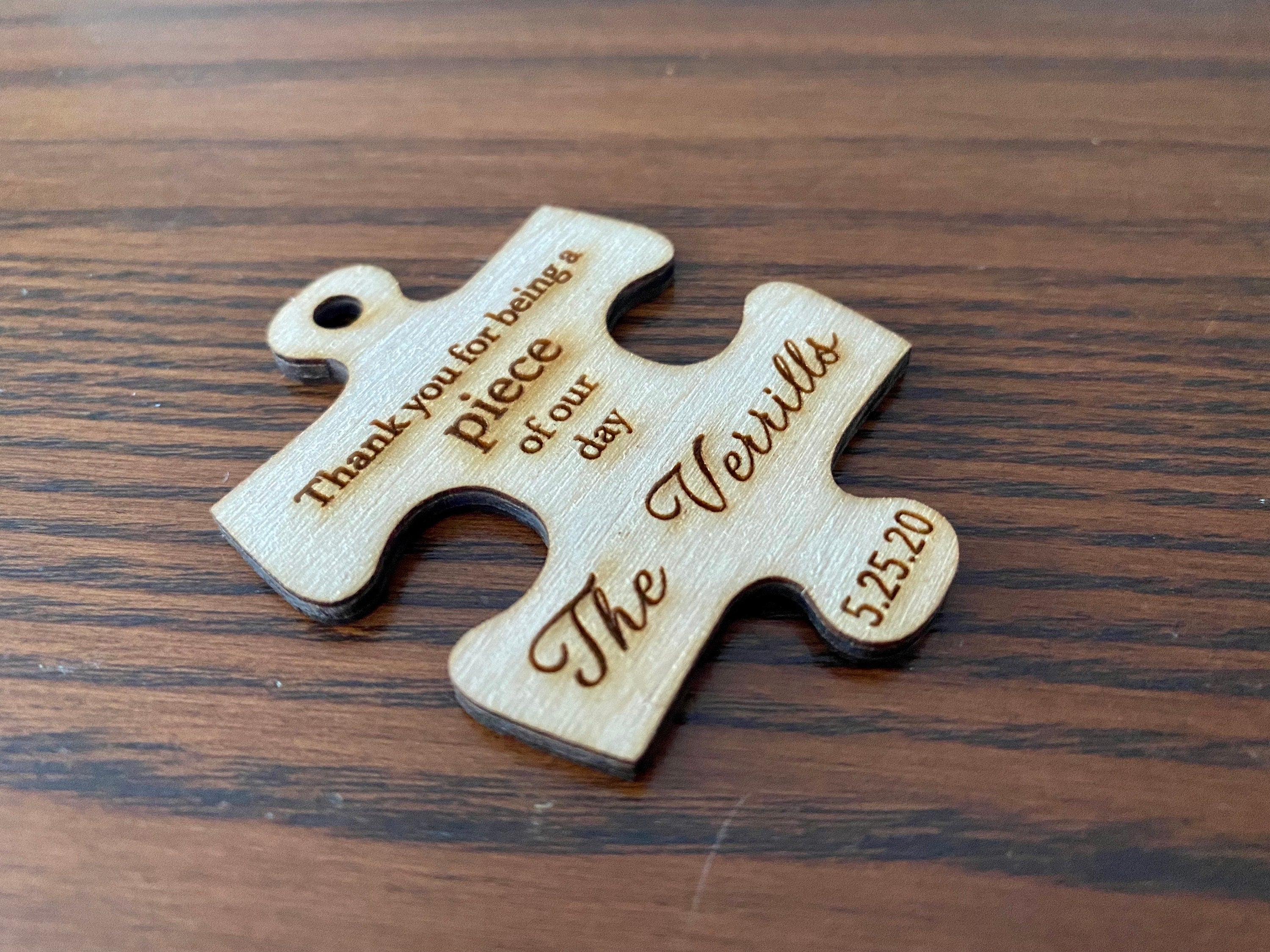 Personalized wooden puzzle piece wedding favor with custom engraving, showcasing rustic charm and durability.