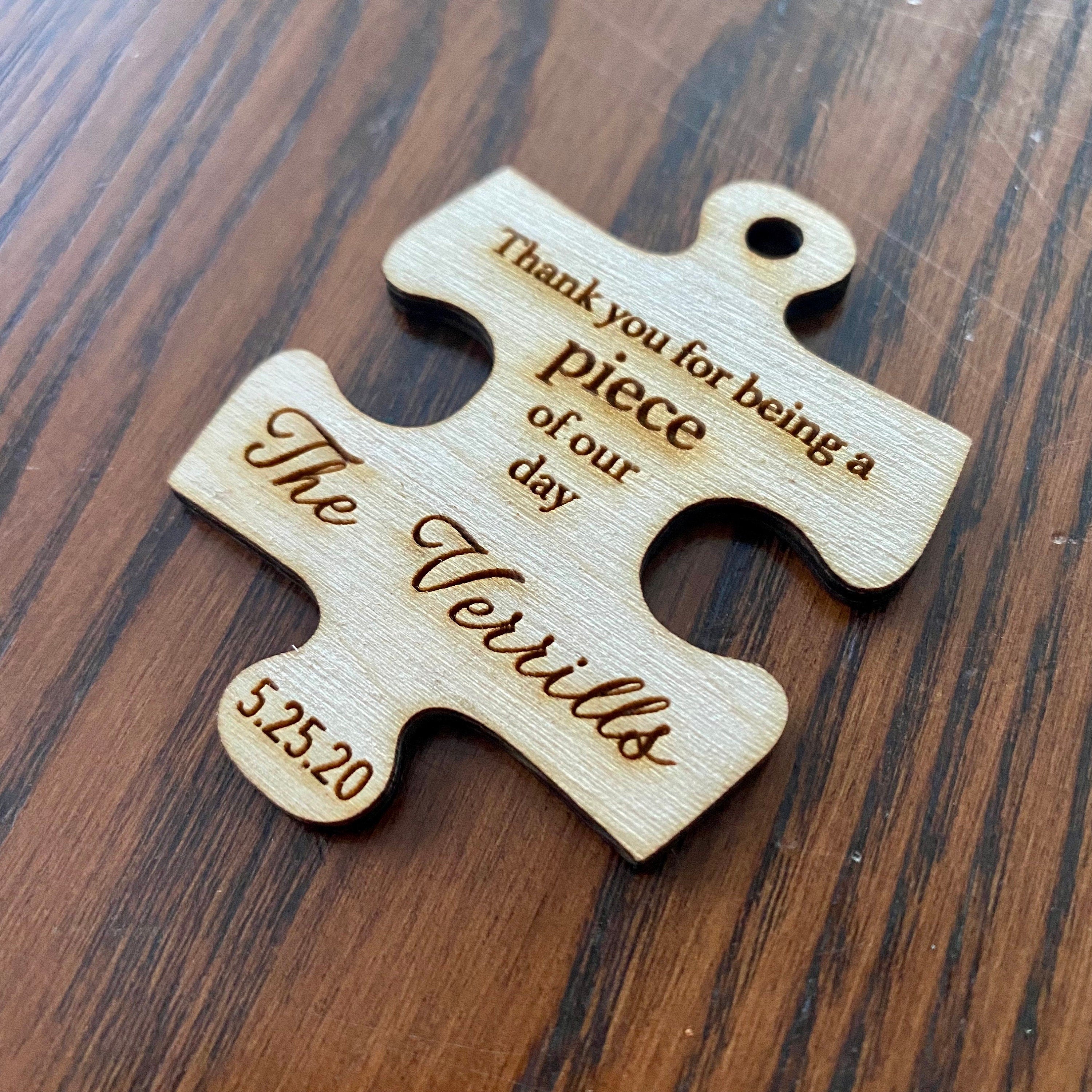 Personalized wooden puzzle piece wedding favor with custom engraving, showcasing rustic charm and durability.