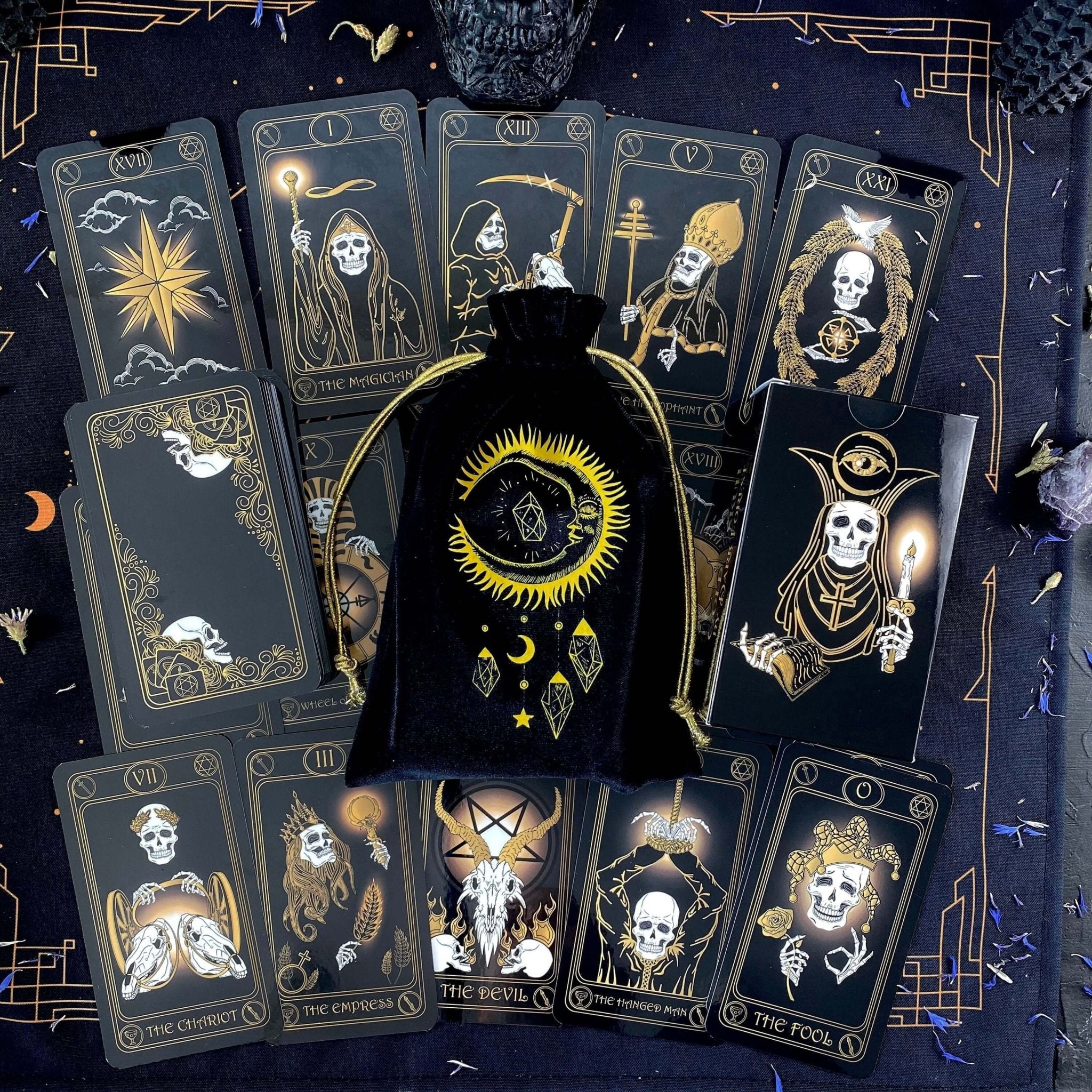 Gold Skull Tarot Deck featuring 78 cards, guidebook, velvet bag, and wooden box, elegantly designed for tarot enthusiasts.