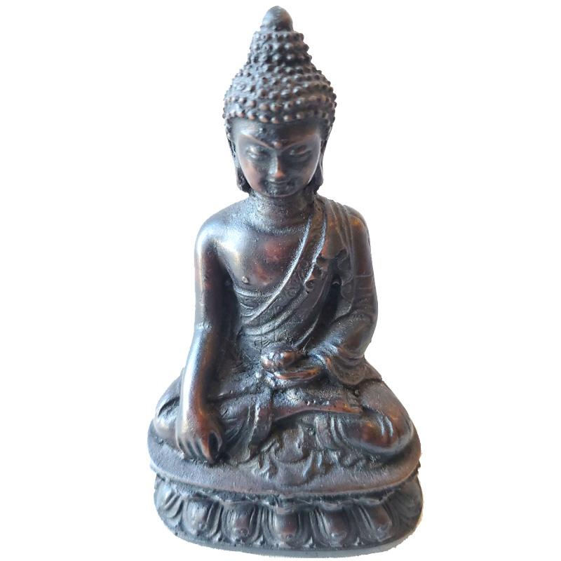 A detailed Little Buddha Resin Statue, showcasing serene features and traditional attire, perfect for meditation and home decor.