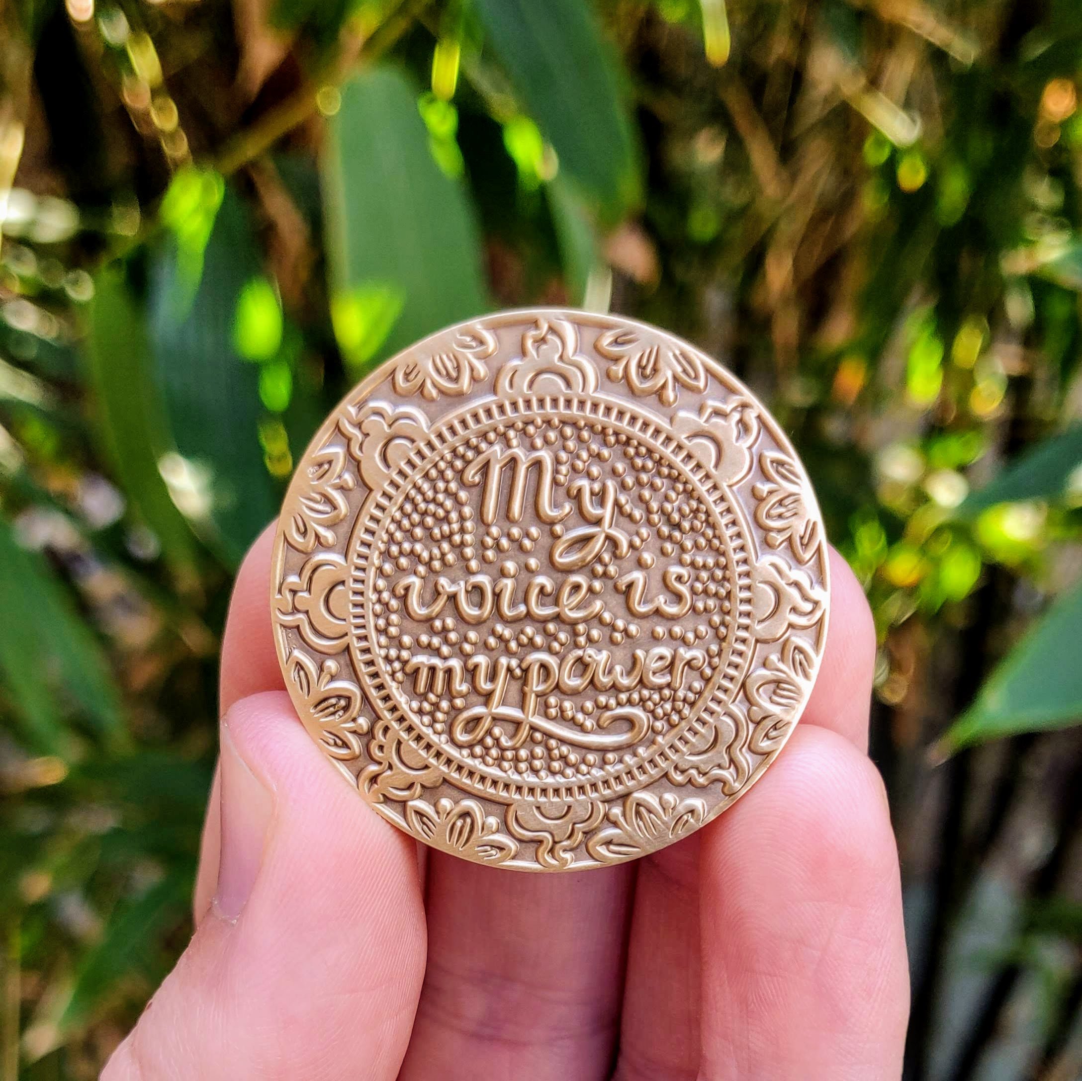 My Voice is my Power Mantra Medallion featuring a heart symbol, mindfulness design, and tree of life imagery, representing love and personal empowerment.