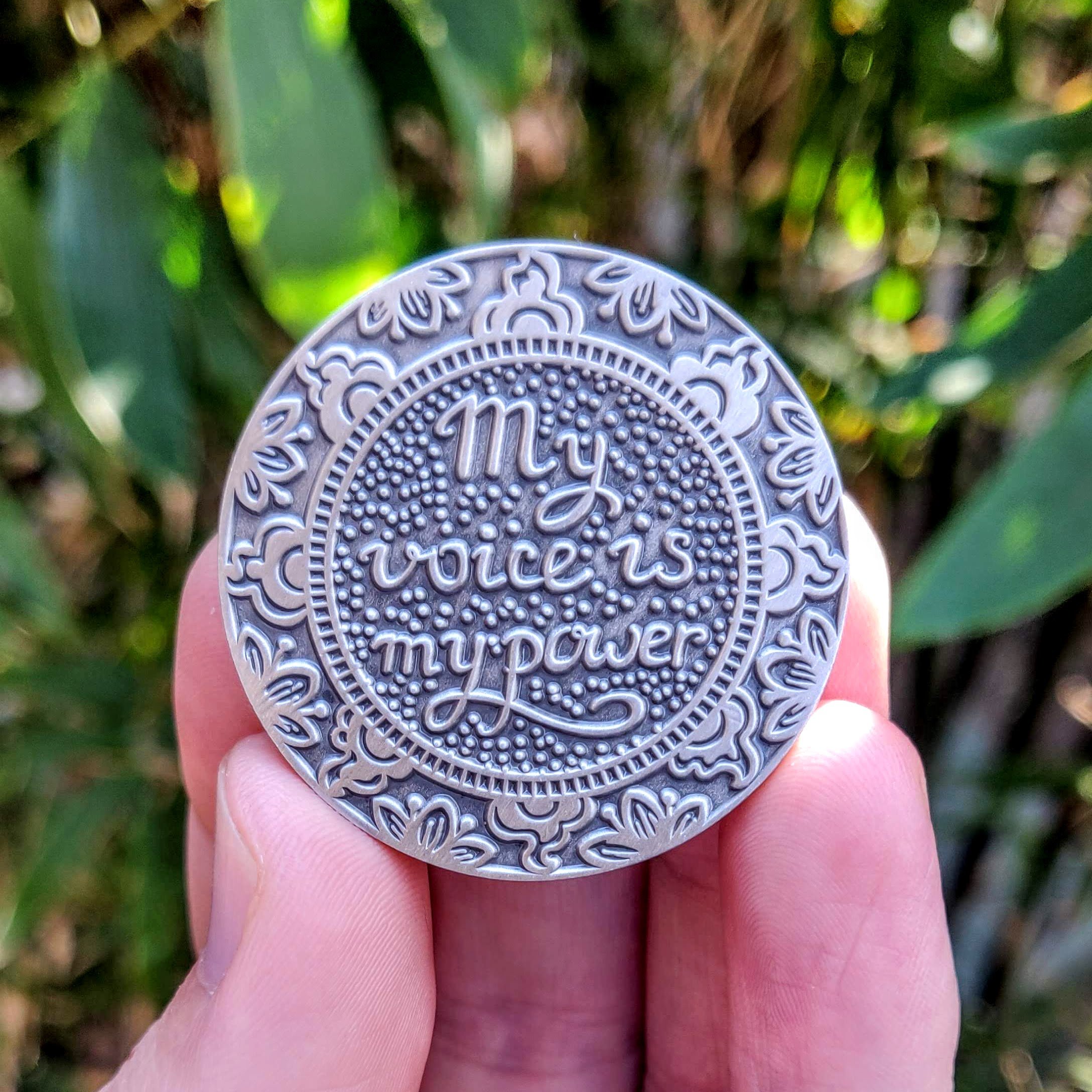 My Voice is my Power Mantra Medallion featuring a heart symbol, mindfulness design, and tree of life imagery, representing love and personal empowerment.