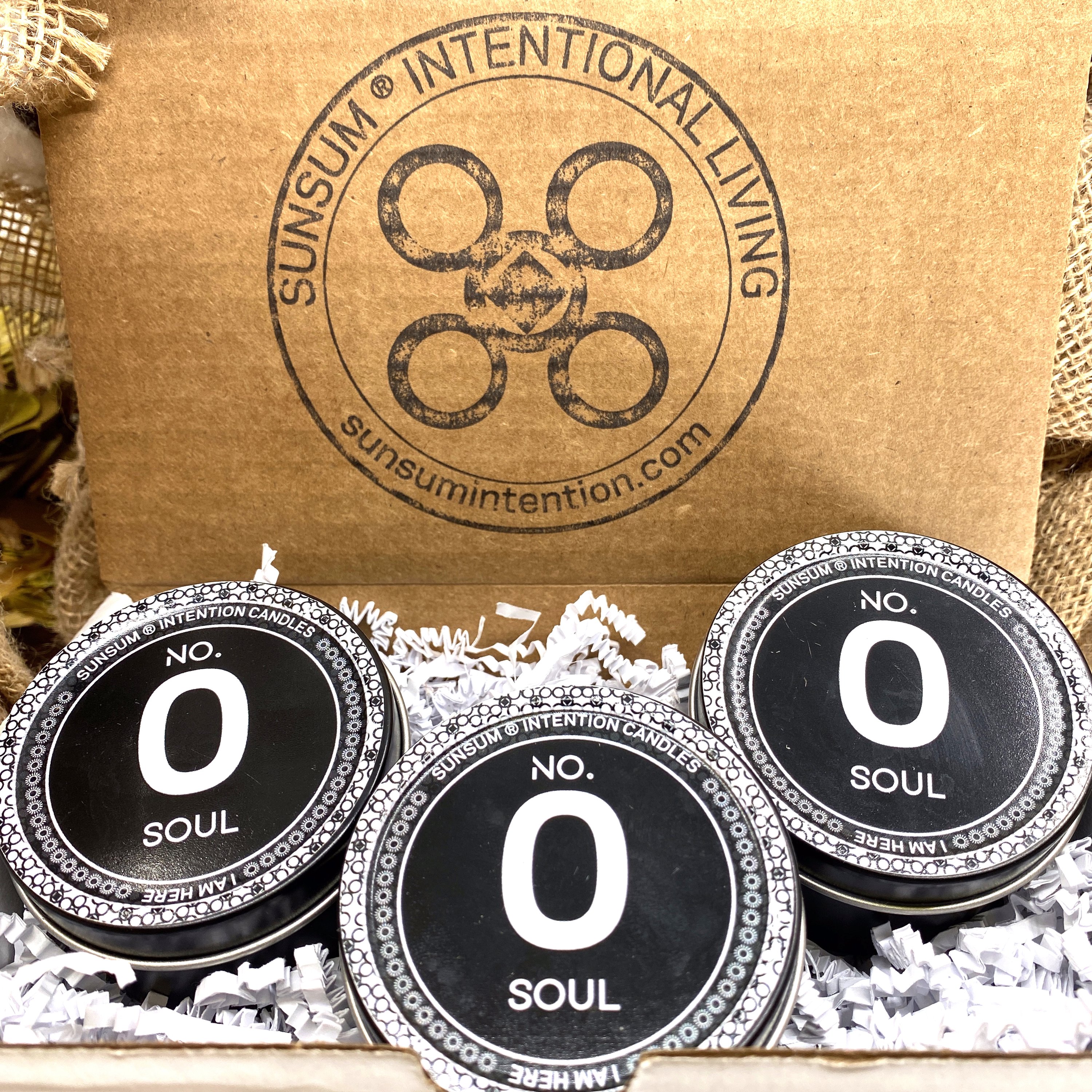 Spirit Number 000 Gift Set featuring handmade products including candles, body oils, and wax melts with aromas of pineapple, sage, and white tea.