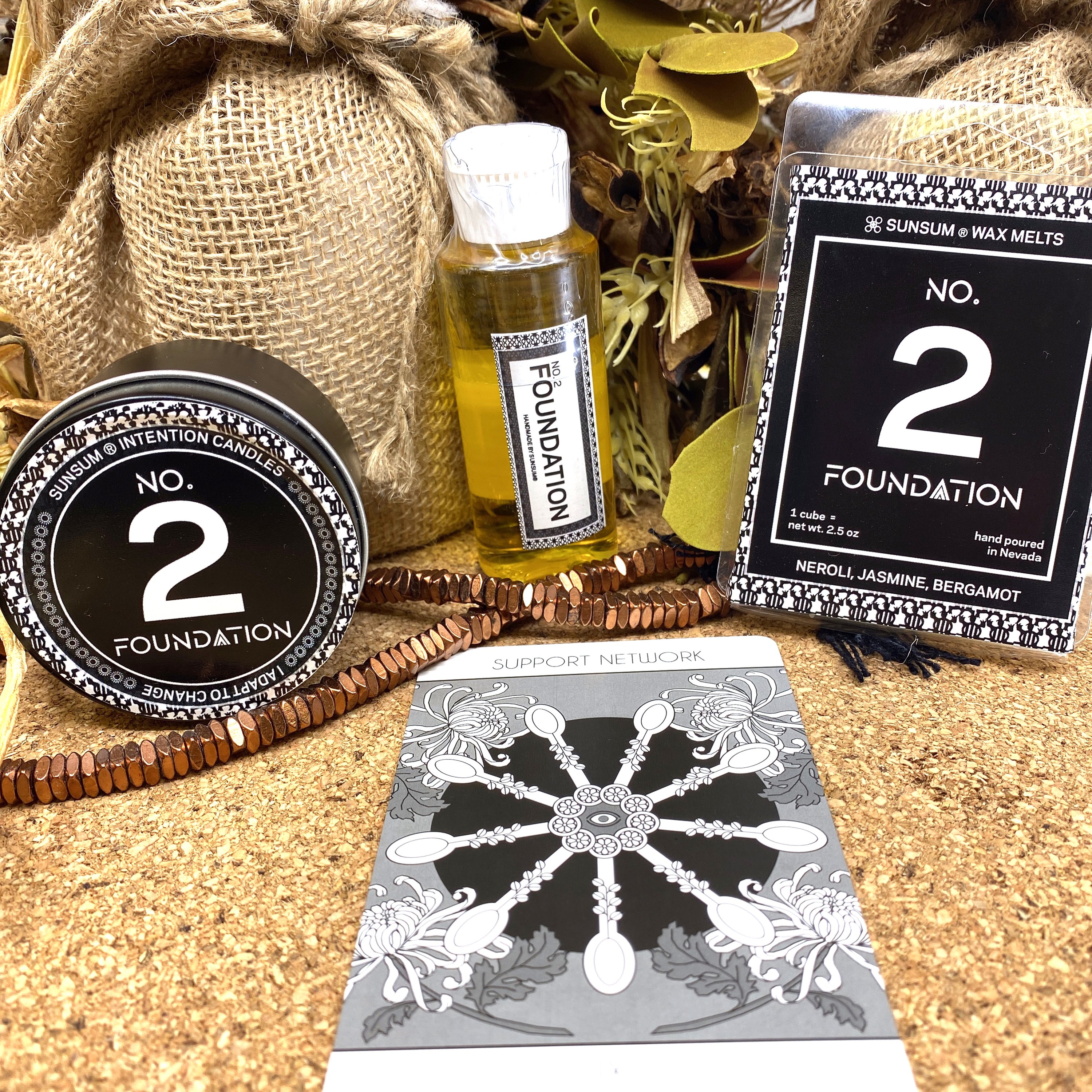 Spirit Number 222 Gift Set featuring handmade candles, body oils, and wax melts with calming aromas of neroli, jasmine, and bergamot.