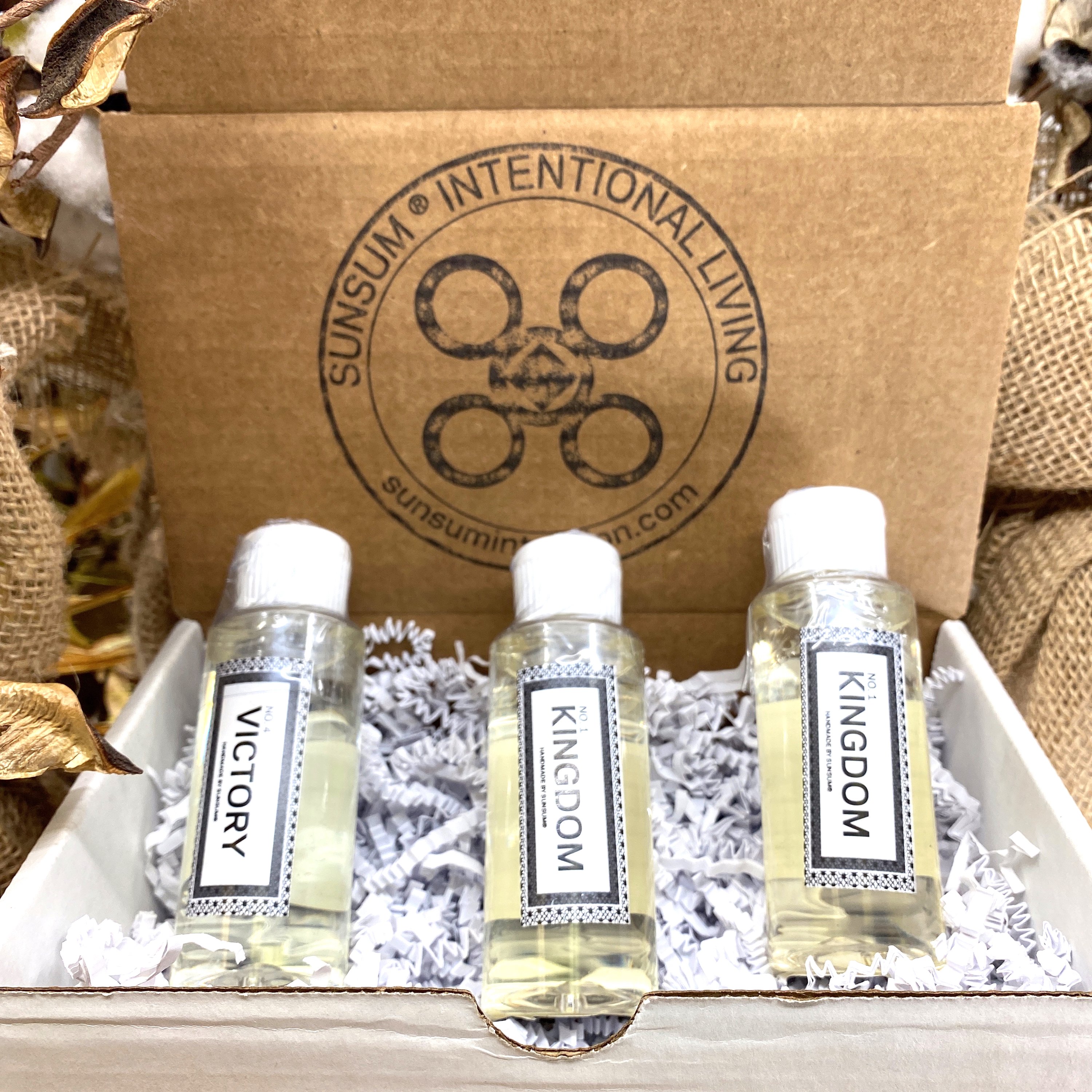 Spirit Number 411 Gift Set featuring handmade candles, body oils, and wax melts with calming aromas of amber, vanilla, lavender, and patchouli.