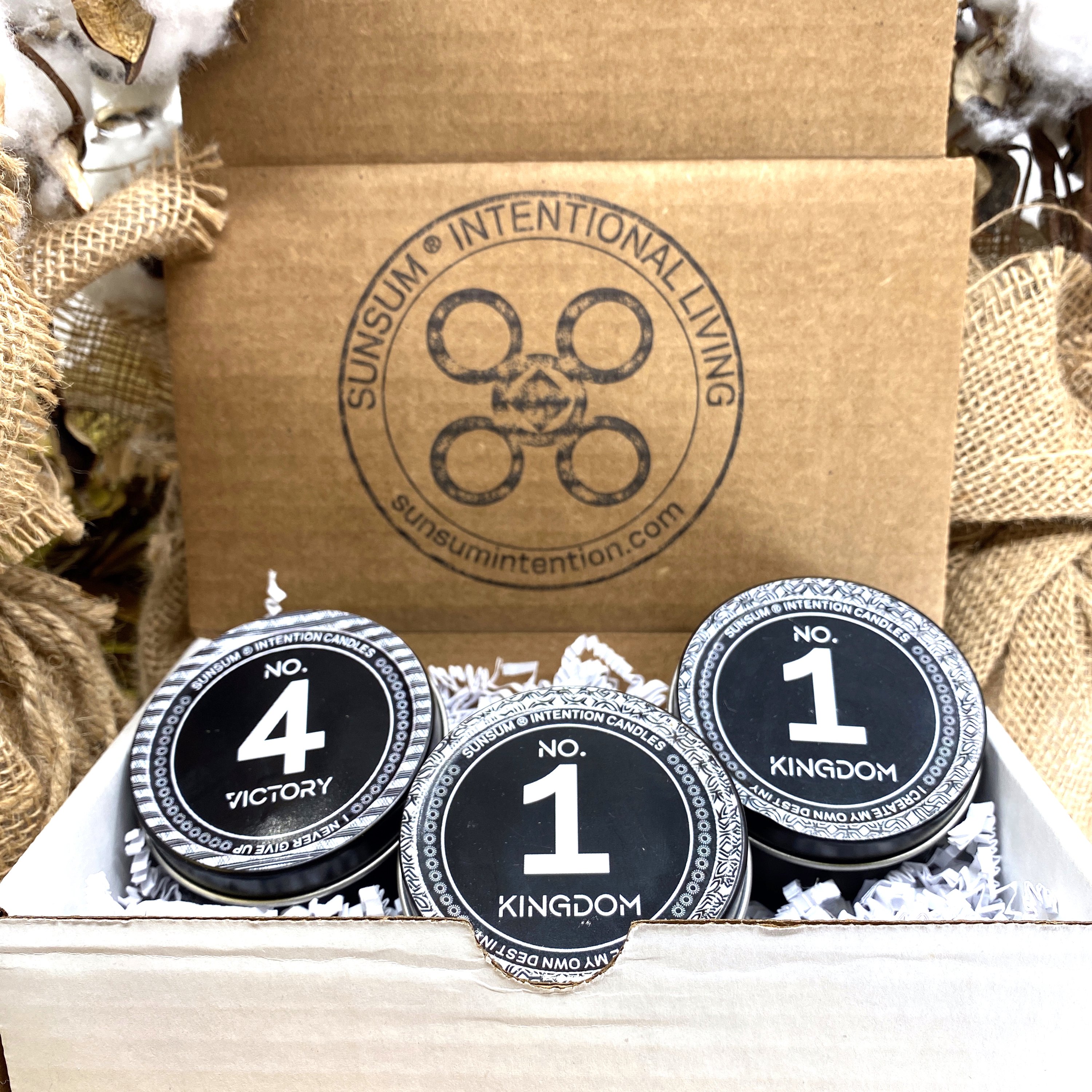 Spirit Number 411 Gift Set featuring handmade candles, body oils, and wax melts with calming aromas of amber, vanilla, lavender, and patchouli.