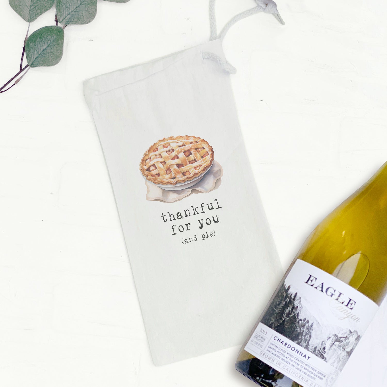 Thankful for Pie canvas wine bag featuring a whimsical design and drawstring closure, perfect for gifting wine.