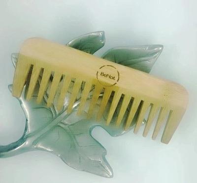 All-Natural Bamboo Comb made from 100% natural bamboo wood, designed for effective grooming and eco-friendly hair care.