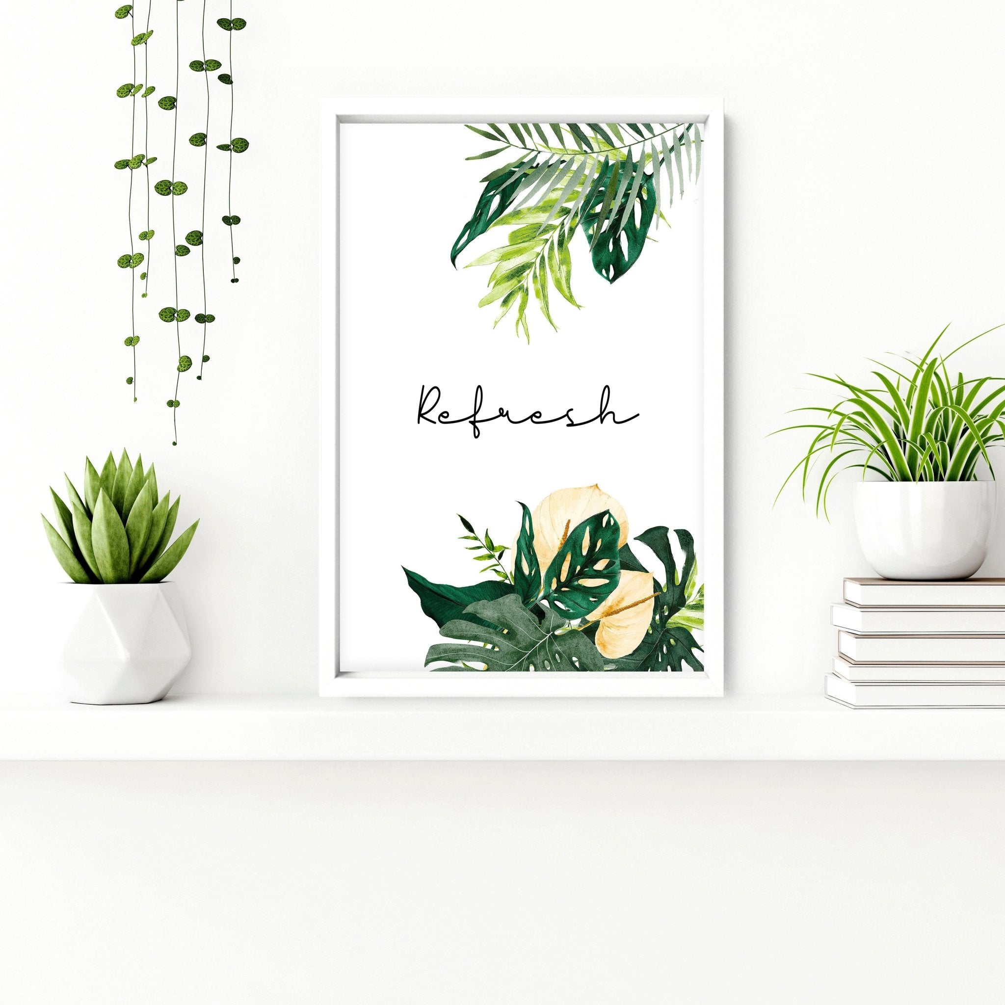 Set of 3 tropical wall art prints featuring vibrant monstera leaves and flowers with calming quotes, perfect for bathroom decor.