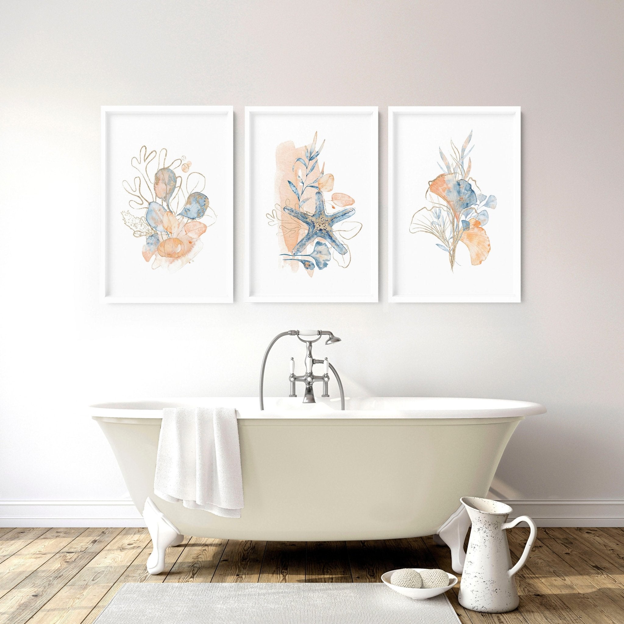 Set of 3 coastal-themed wall art prints featuring muted tones of blue, blush pink, and red, designed for bathroom decor.