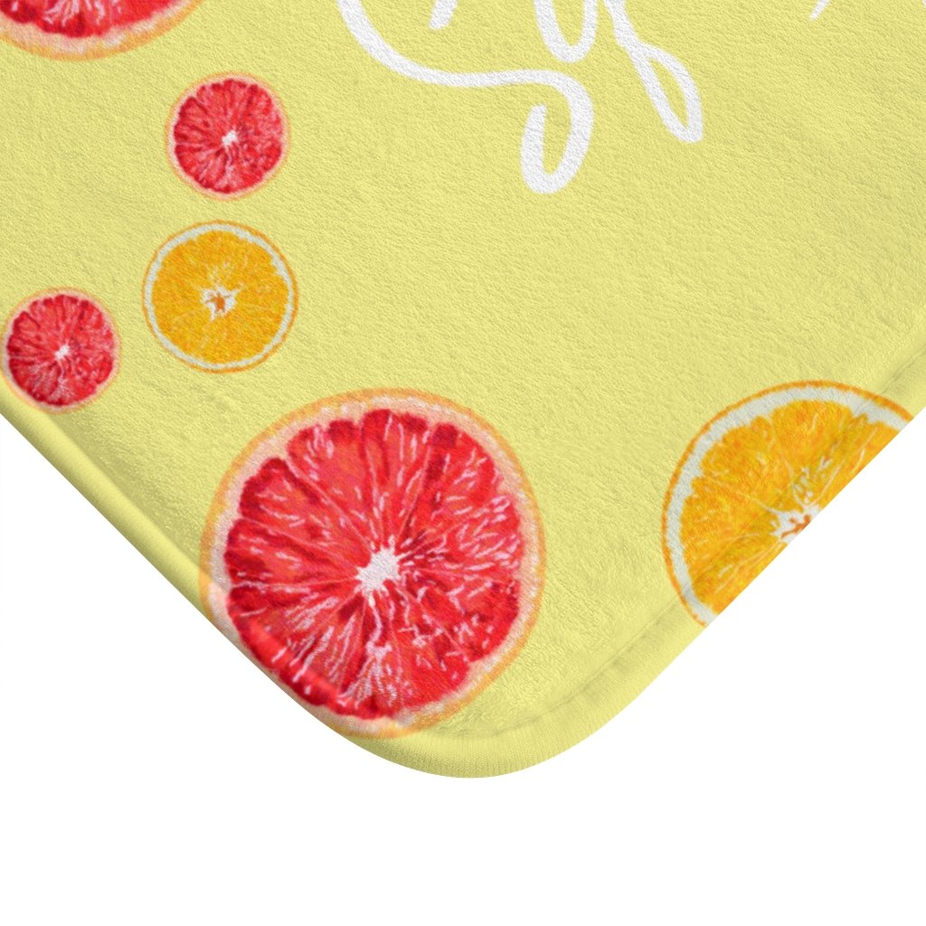 Citrus Squeeze the Day Bath Mat featuring a vibrant citrus design with anti-slip backing, perfect for bathroom safety and style.