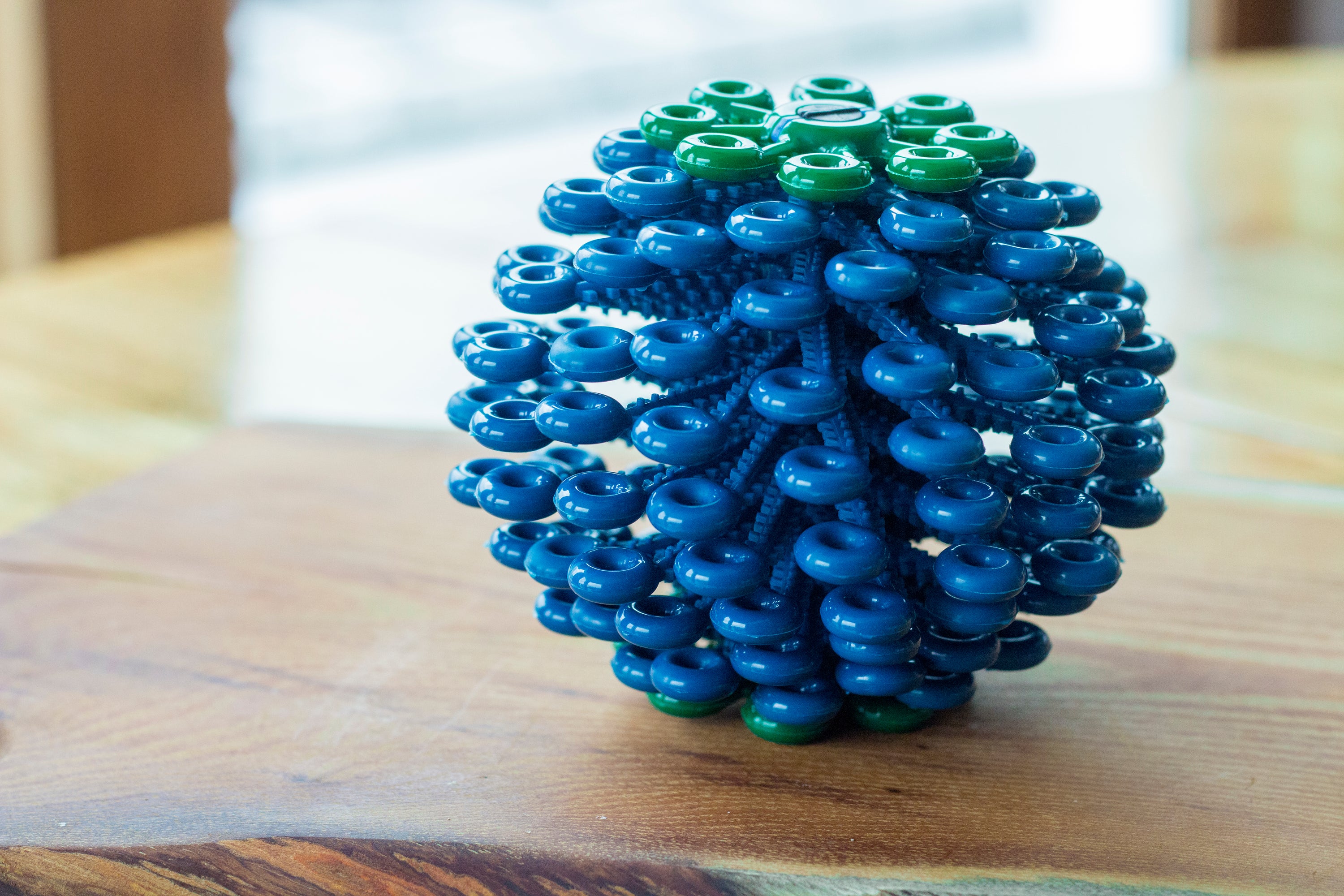 Cora Ball laundry ball designed to collect microfibers during washing, promoting ocean conservation.