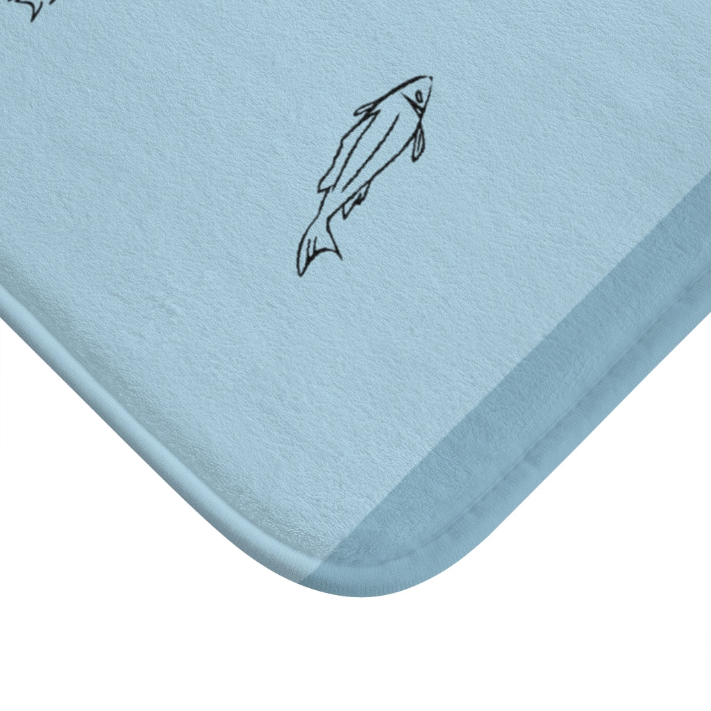 Fishes in the Ocean Bath Mat featuring vibrant marine life design and anti-slip backing.