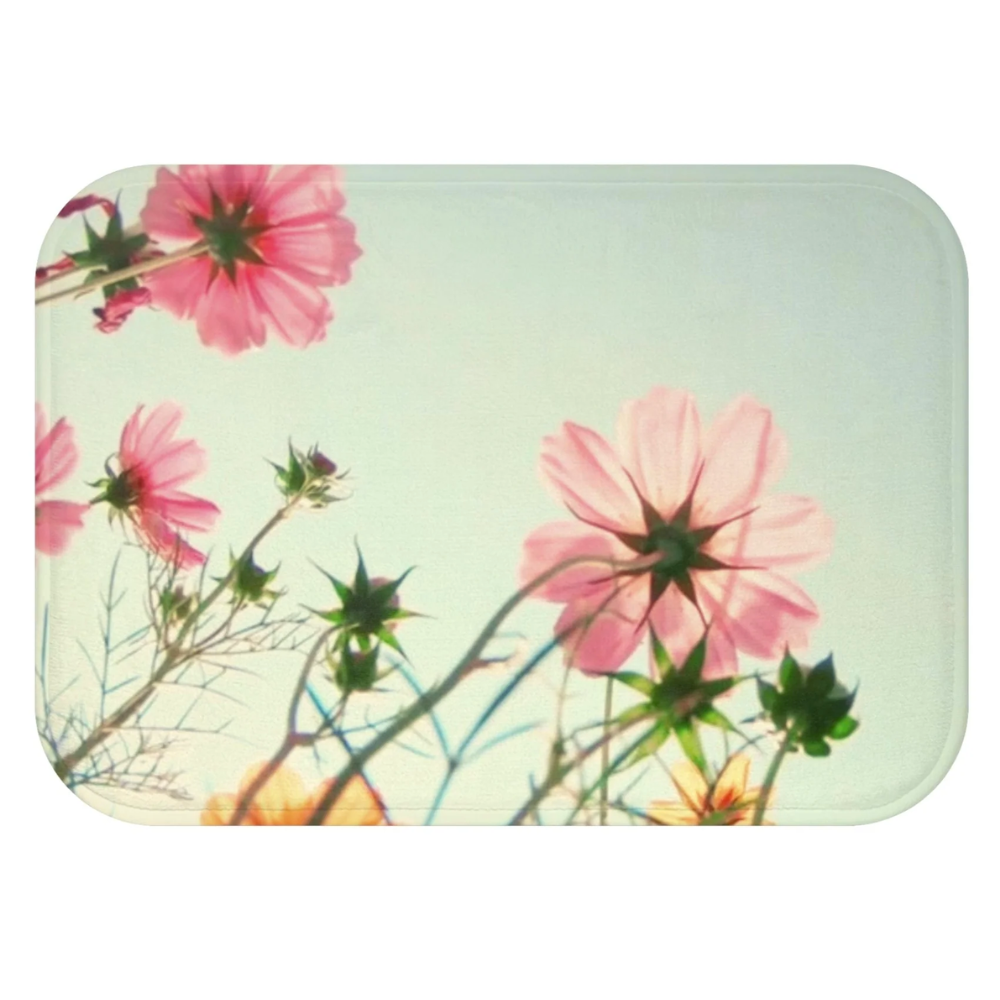 Flowers In The Field Bath Mat featuring a vibrant floral design with anti-slip backing, perfect for bathroom safety and style.