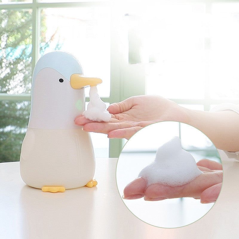 Lovely Penguin Shaped Foam Soap Dispenser in pink and blue, designed for touchless handwashing with a cute penguin pattern.