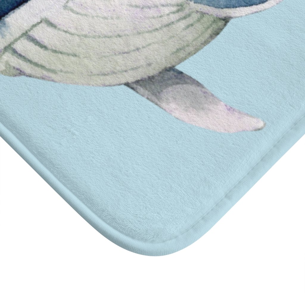 A soft and stylish Humpback Whale Bath Mat with anti-slip backing, featuring a vibrant whale design, perfect for enhancing bathroom decor.