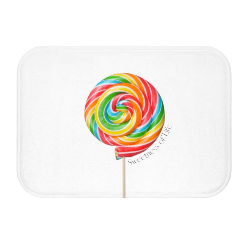 Lollipop Sweetness of Life Message Bath Mat in white with colorful lollipop design, featuring anti-slip backing and plush microfiber material.