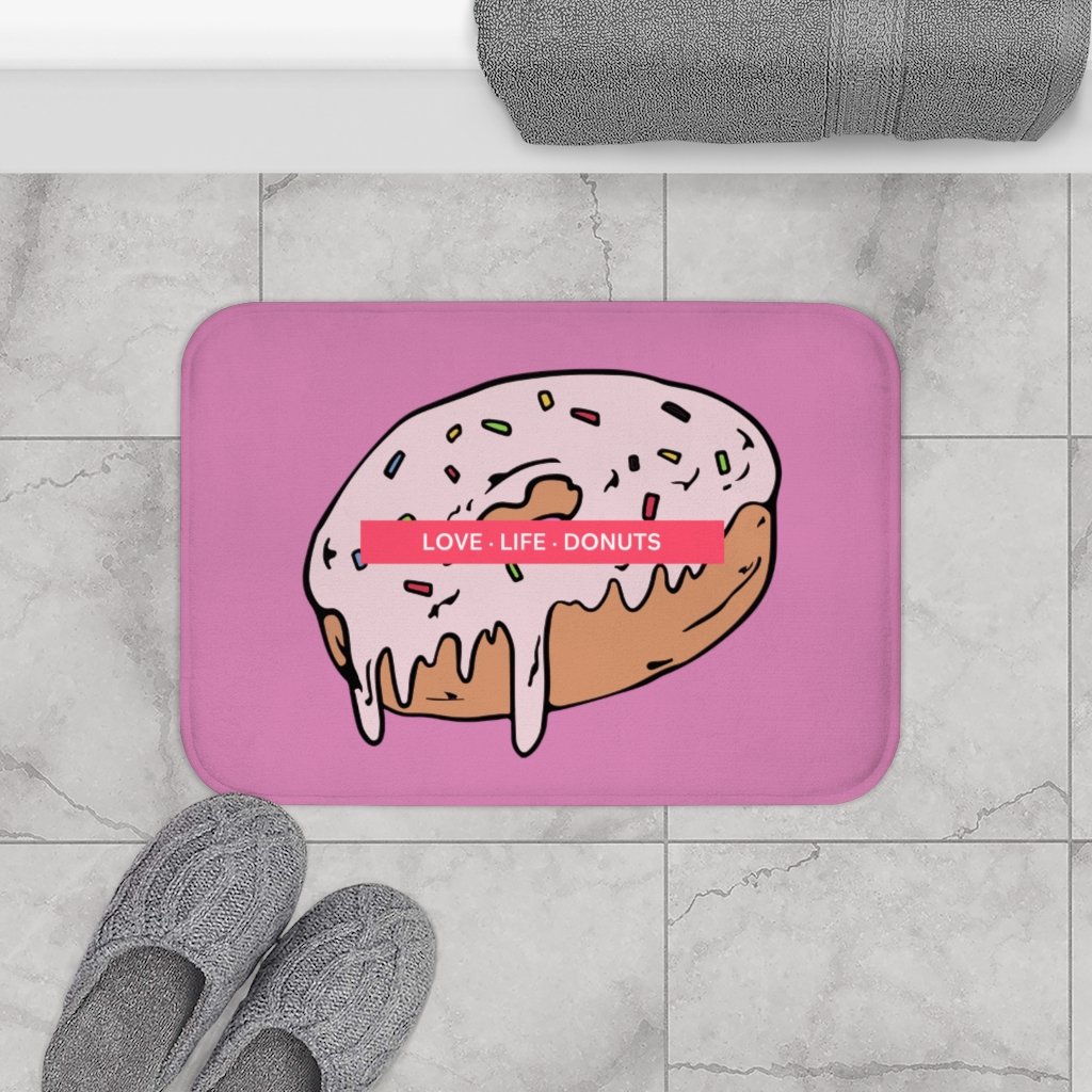 Love Life Donuts Bath Mat featuring a colorful donut design with anti-slip backing, perfect for bathroom safety and style.