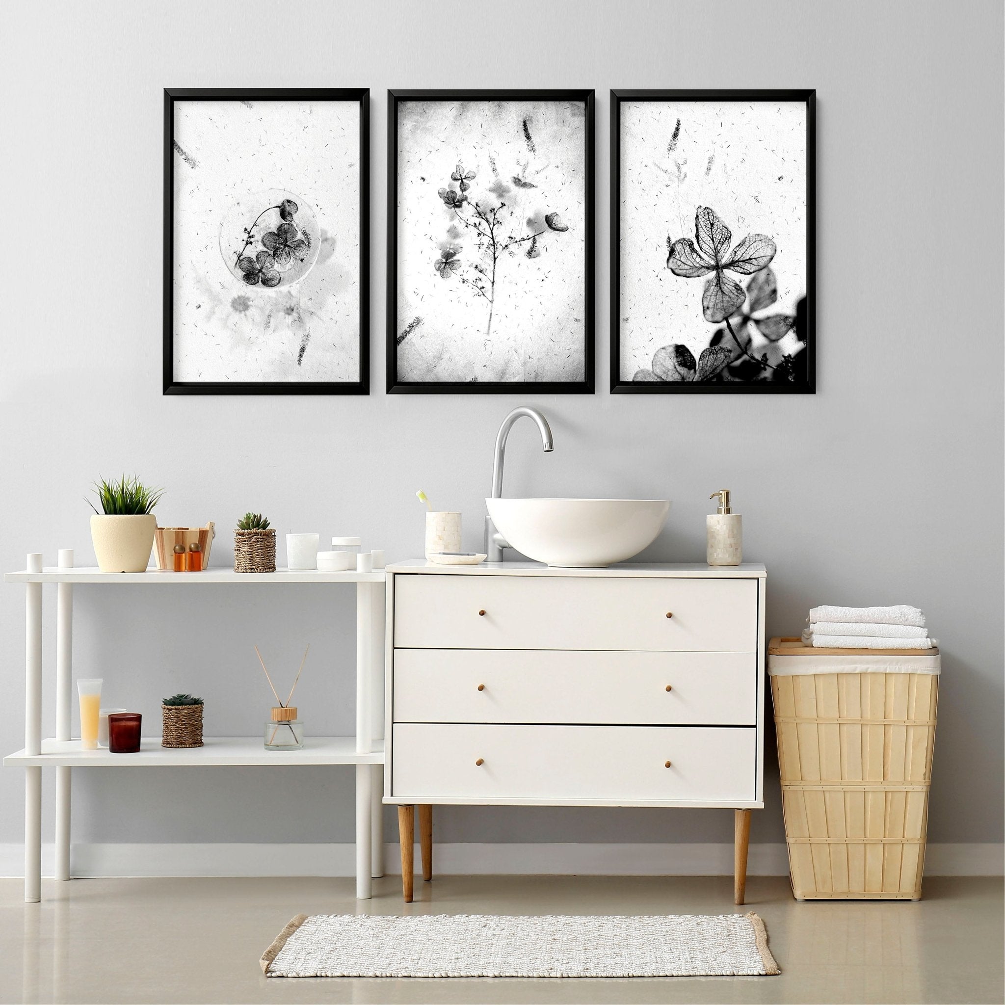 Set of 3 modern botanical wall art prints in grey, white, and black, designed for bathroom decor.