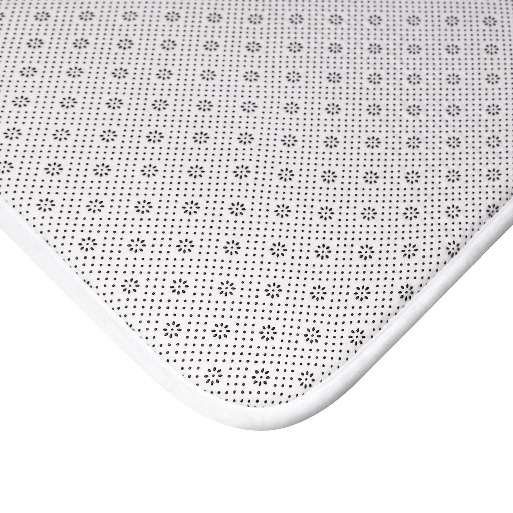 Ocean Waves Bath Mat featuring a stylish ocean waves design with anti-slip backing and durable edge binding.