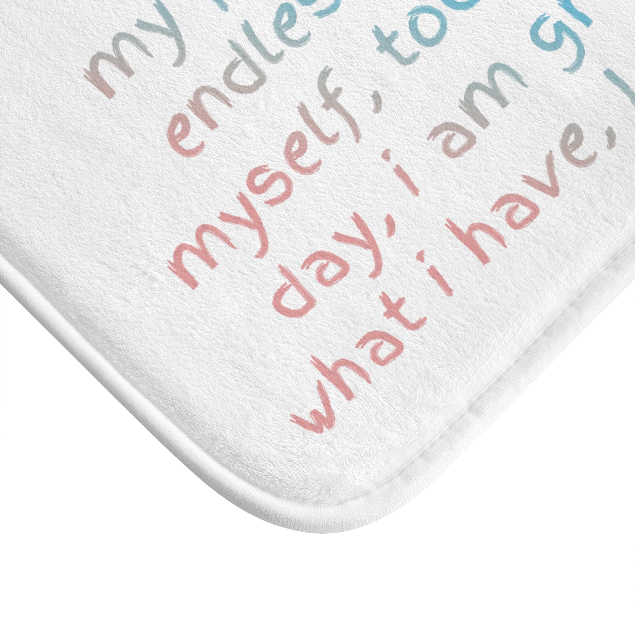 Positive Affirmation Bath Mat with anti-slip backing, featuring uplifting designs and a soft microfiber surface, perfect for bathroom safety and style.