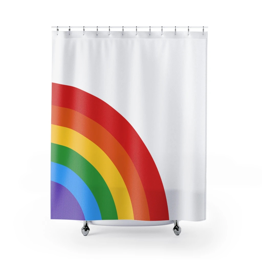 Colorful half rainbow shower curtain hanging in a bathroom, showcasing vibrant hues and a stylish design.