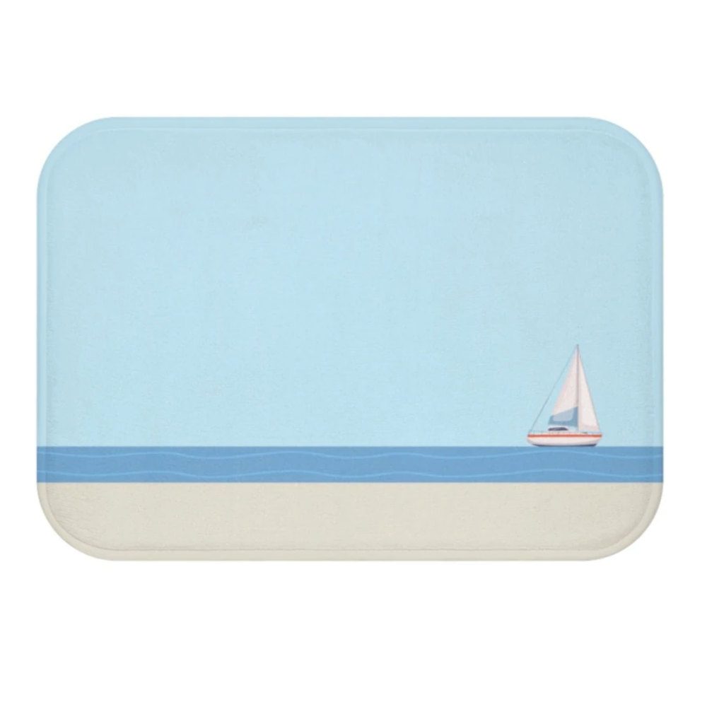 Sail Boat in the Ocean Bath Mat featuring a nautical design with anti-slip backing and soft microfiber material.