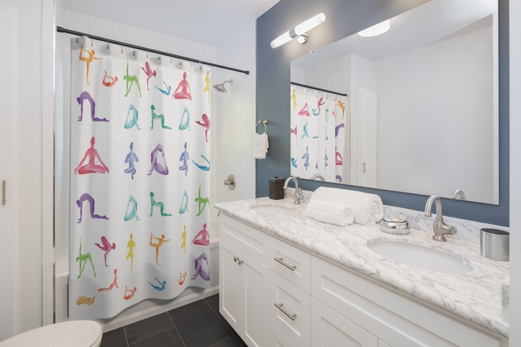 Yoga Sanctuary Shower Curtains featuring vibrant yoga poses print on durable polyester fabric, perfect for bathroom decor.