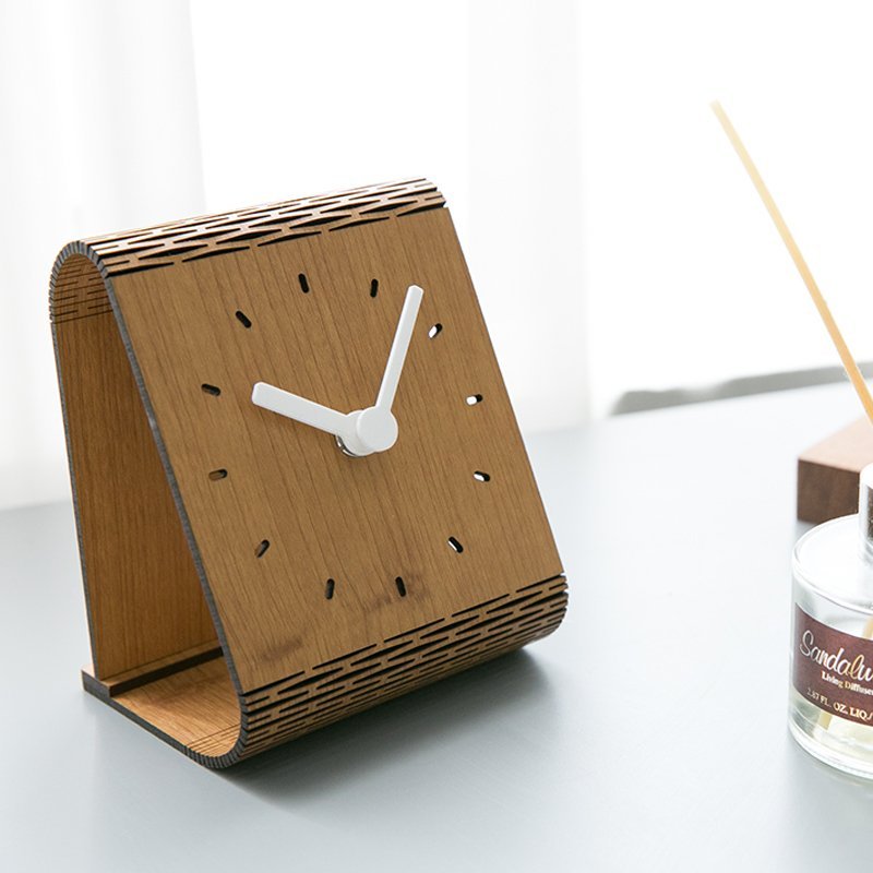 Bent Wood Clock II featuring a minimalist design, crafted from Medium Density Fiberboard, showcasing a silent operation without Arabic numerals.