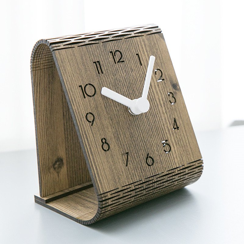 Bent Wood Clock featuring a minimalist design with Arabic numerals, crafted from Medium Density Fiberboard, ideal for silent operation.