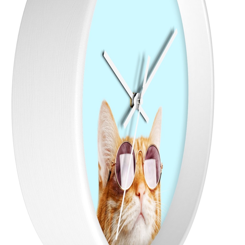 A whimsical wall clock featuring a cat design with a wooden frame and plexiglass face, ideal for indoor use.