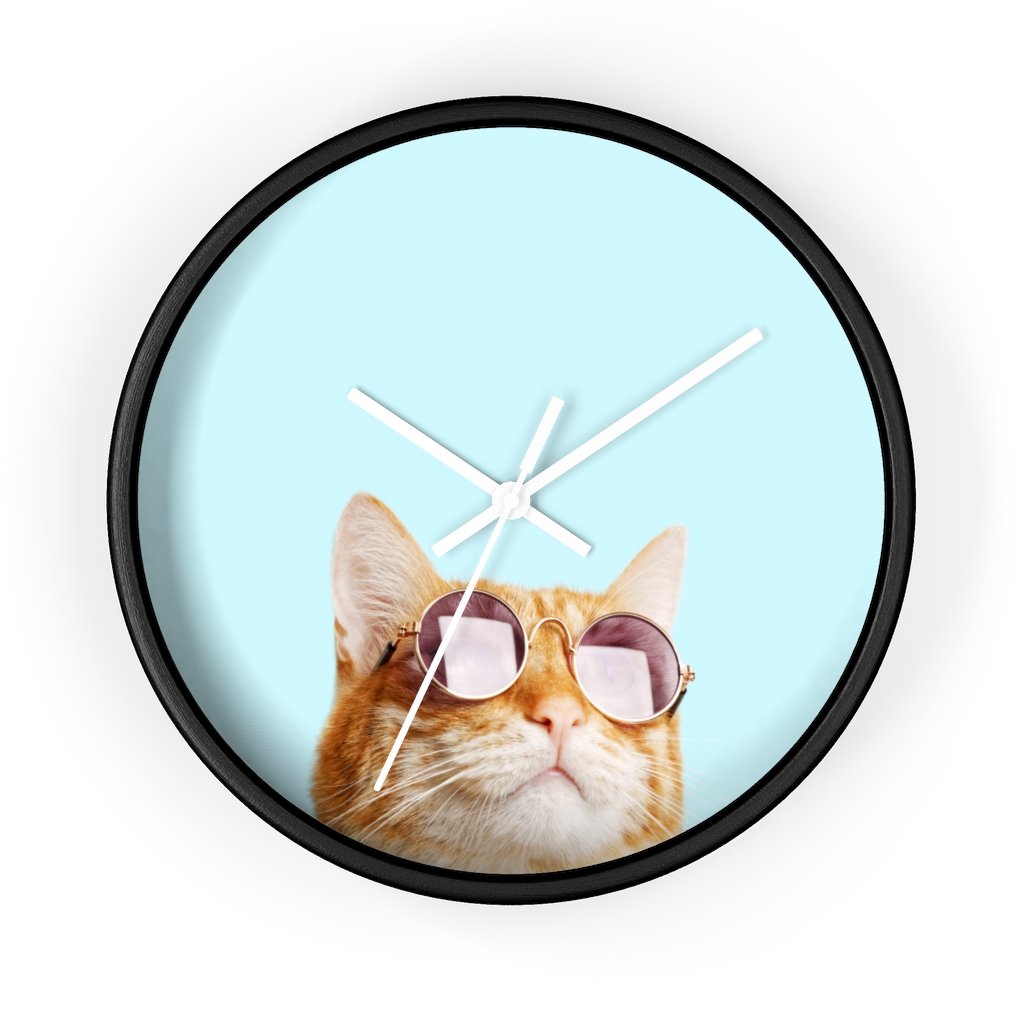 A whimsical wall clock featuring a cat design with a wooden frame and plexiglass face, ideal for indoor use.