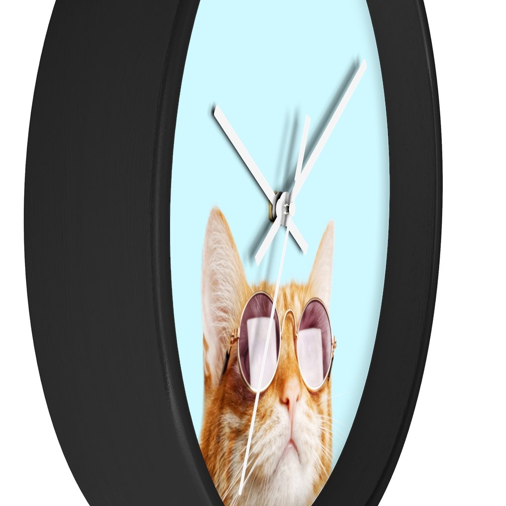 A whimsical wall clock featuring a cat design with a wooden frame and plexiglass face, ideal for indoor use.