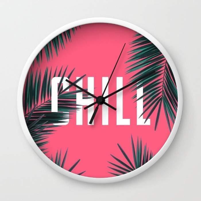 Chill Wall Clock featuring a 10-inch diameter, high-impact plexiglass face, available in black or white frames with matching hands.