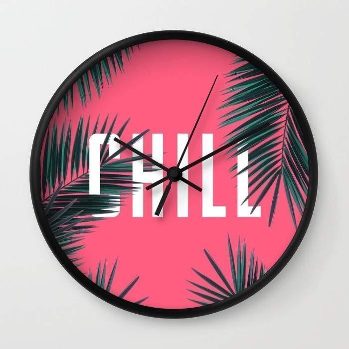 Chill Wall Clock featuring a 10-inch diameter, high-impact plexiglass face, available in black or white frames with matching hands.