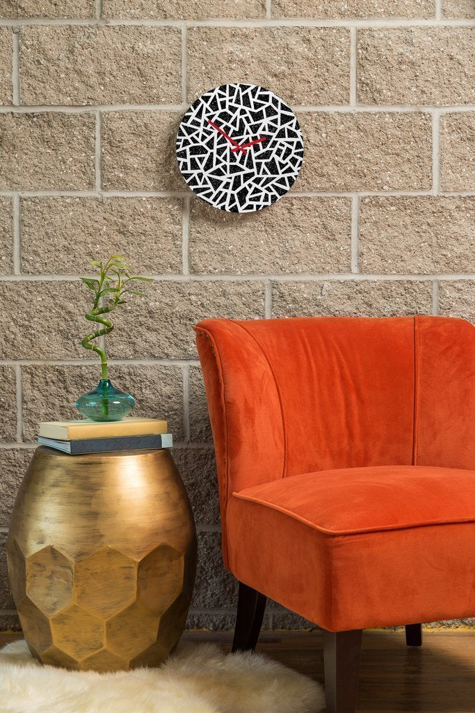 A stylish 12-inch round wall clock featuring customizable artwork and quartz movement, perfect for home decor.