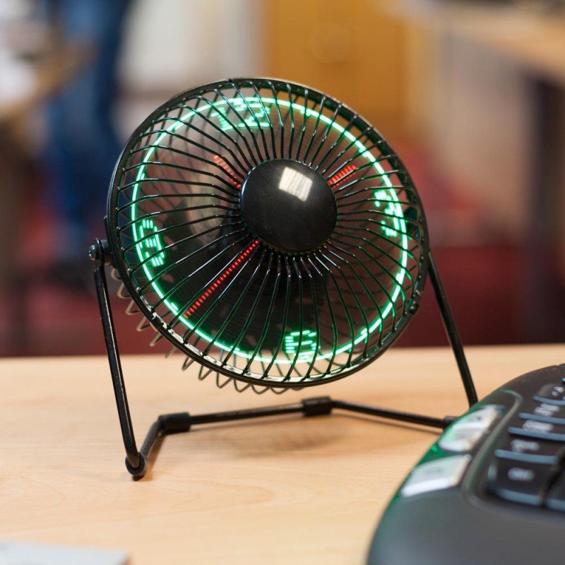 LED Desktop Clock Fan displaying time and temperature with a sleek design, featuring a rotative head and customizable message display.