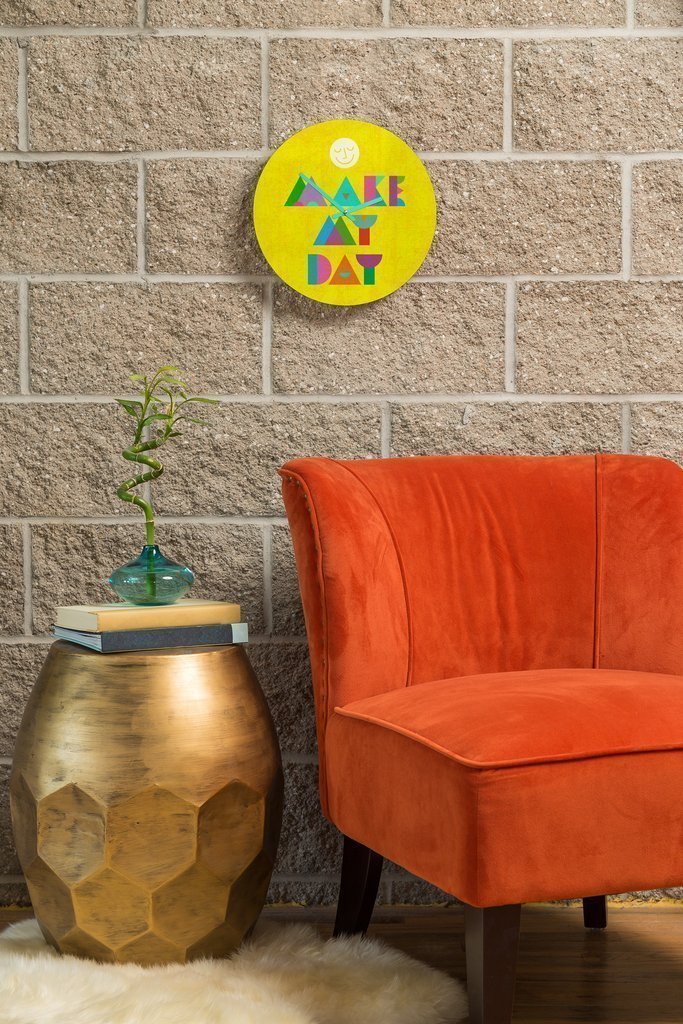 A stylish 12-inch round wall clock featuring customizable artwork and coordinating clock hands, perfect for home décor.