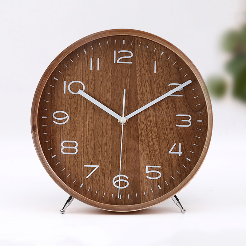 A sleek Minimalist Style Wood Clock made from natural wood, featuring a silent mechanism and a simple, elegant design suitable for any decor.