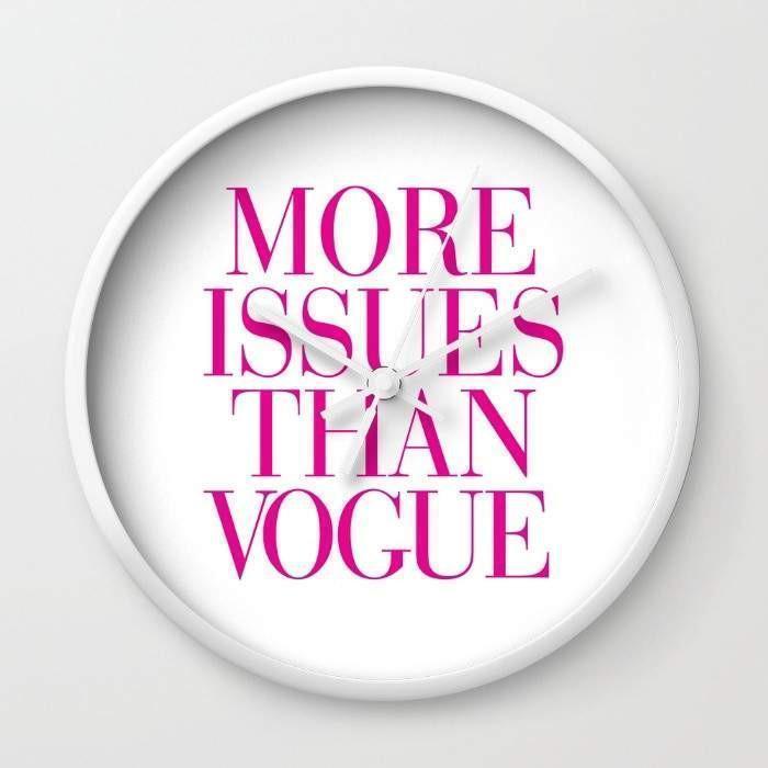 More Issues than Vogue Wall Clock with black and white frame options, featuring a stylish phrase and high-impact plexiglass face.