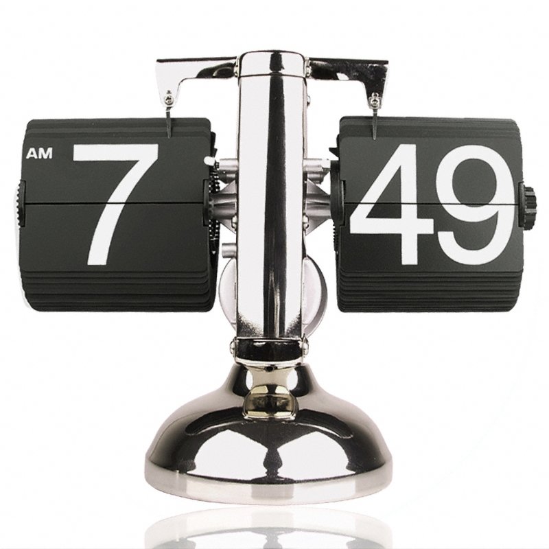 A stylish Retro Flip Clock with a silver finish, featuring a flip-down display for hours and minutes, showcasing easy-to-read numbers.