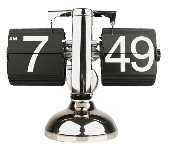 A stylish Retro Flip Clock with a silver finish, featuring a flip-down display for hours and minutes, showcasing easy-to-read numbers.