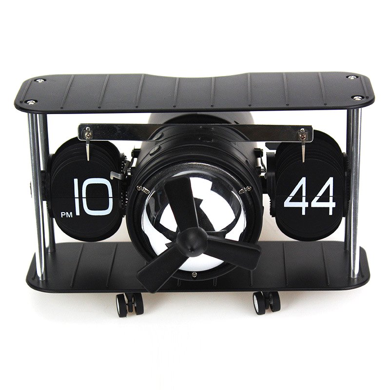 The Wright Brothers Plane Auto Flip Clock featuring a bicycle design with clear digits and a quality Japanese engine, perfect for home or office decor.