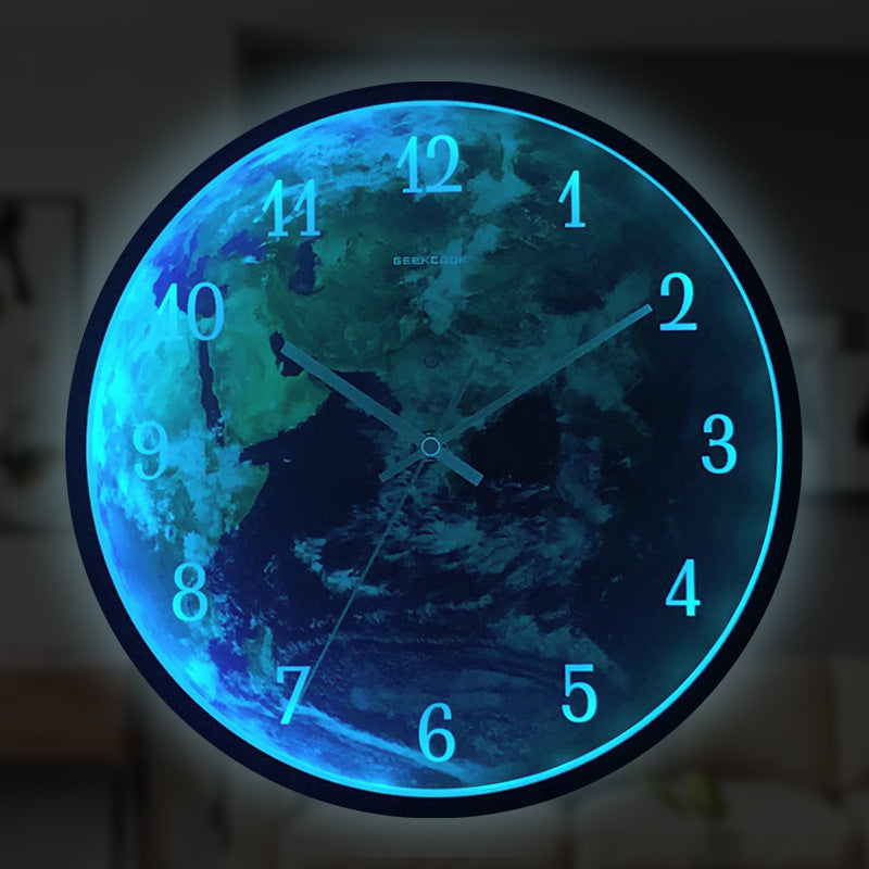 Voice-activated Induction LED Night Light Wall Clock with a round metal frame and luminous dial, designed for easy nighttime visibility.