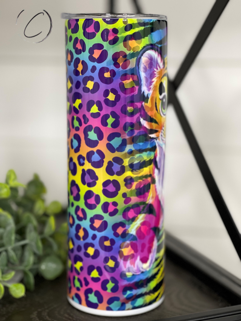 A vibrant 90's Art Tiger 20oz Skinny Tumbler featuring a colorful tiger design, perfect for hot and cold beverages.