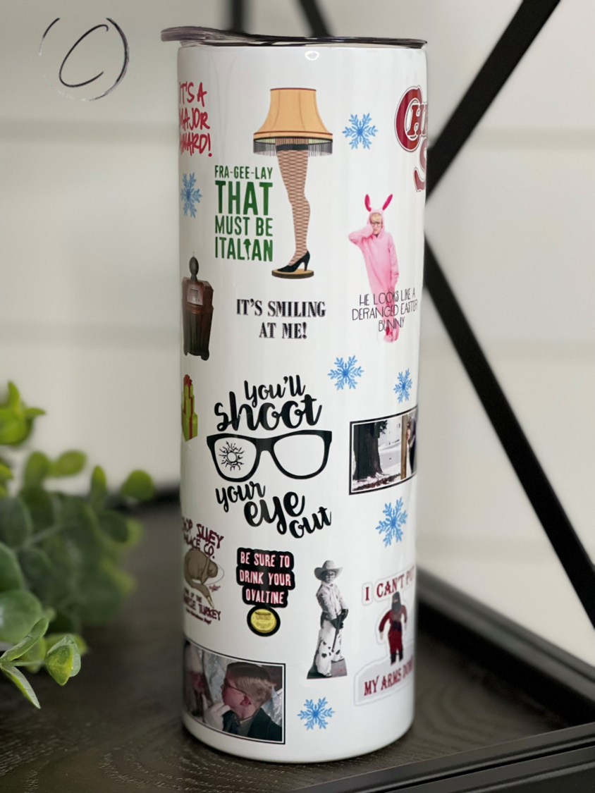 A Christmas Story 20oz Skinny Tumbler featuring a festive design, reusable straw, and high-quality construction.