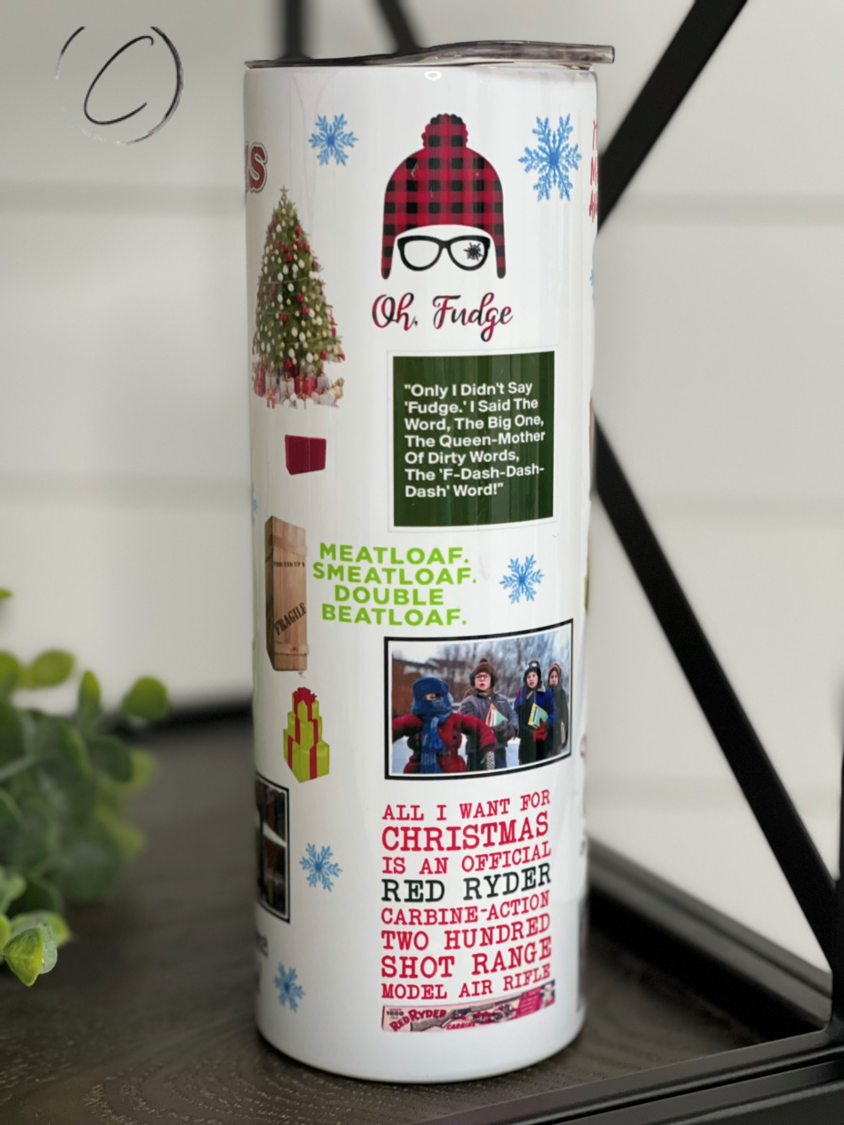 A Christmas Story 20oz Skinny Tumbler featuring a festive design, reusable straw, and high-quality construction.