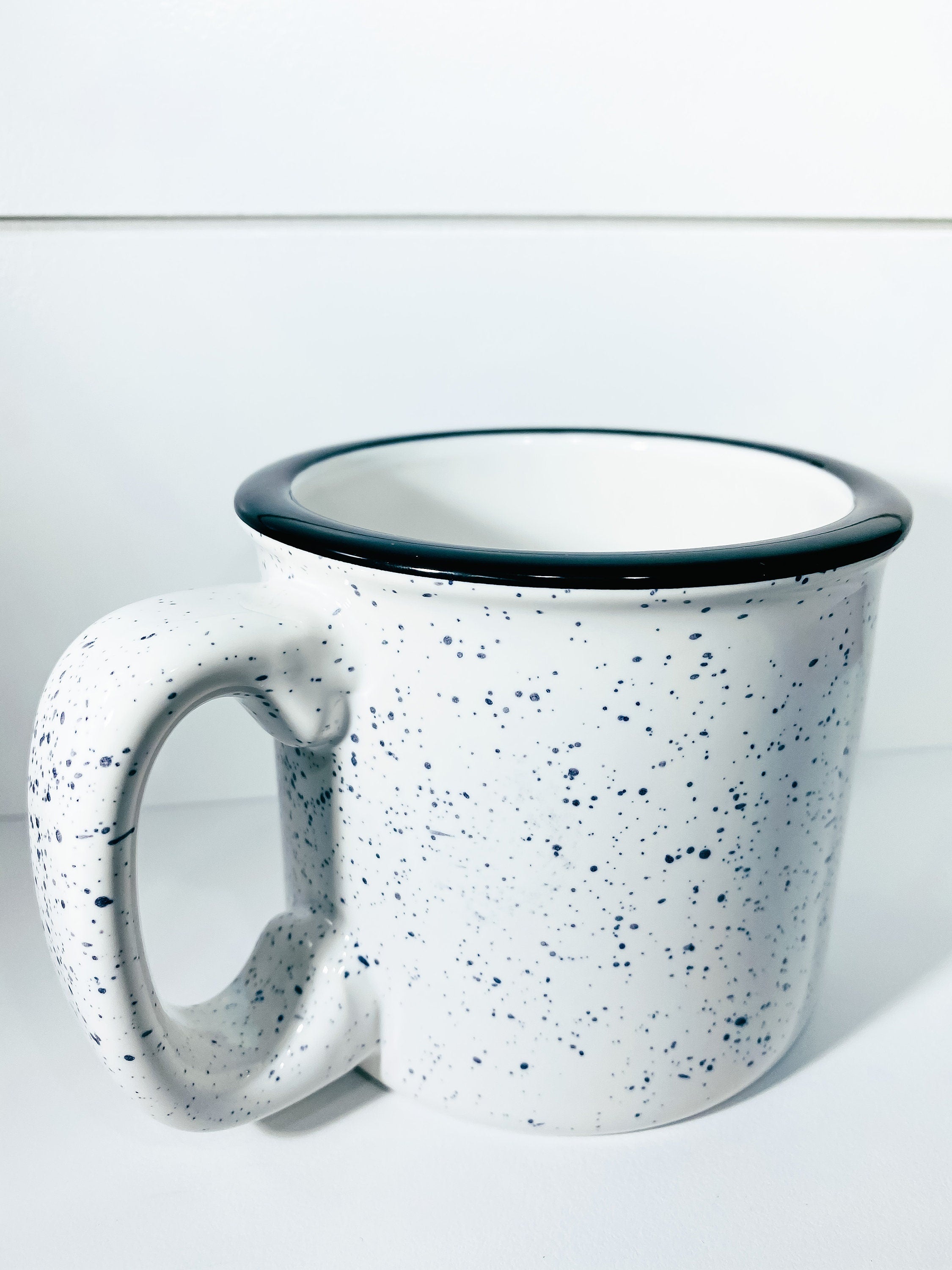 Ceramic campfire mug with humorous design, perfect for coffee lovers.